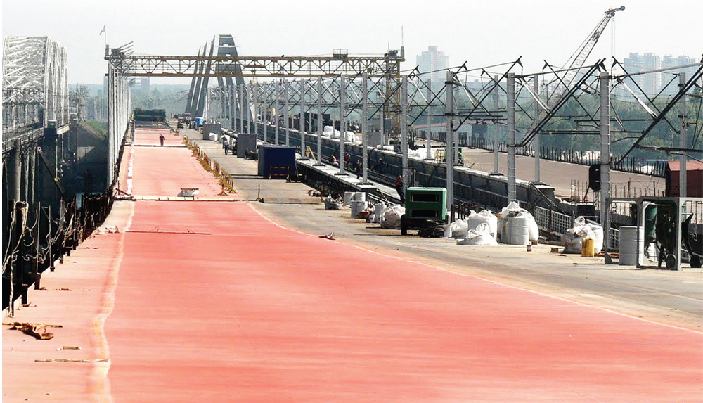 Будівництво залізнично-автомобільного мостового переходу через р. Дніпро в м. Києві